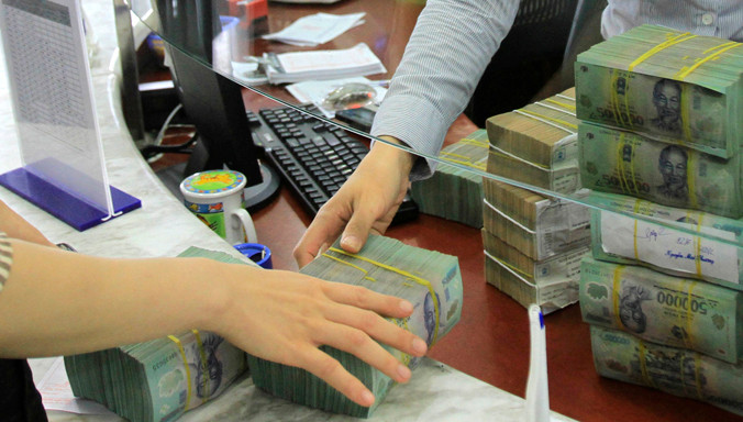 Xử lý nợ xấu: Lợi nhuận ngân hàng giảm quá nửa