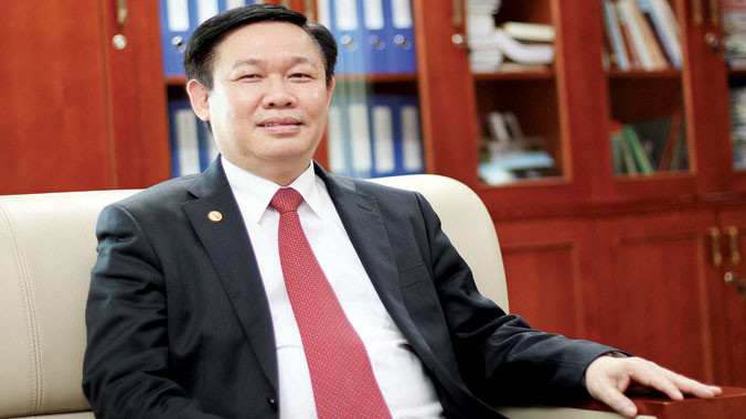 Ủy viên T.Ư Ðảng, Trưởng ban kinh tế T.Ư Vương Ðình Huệ.