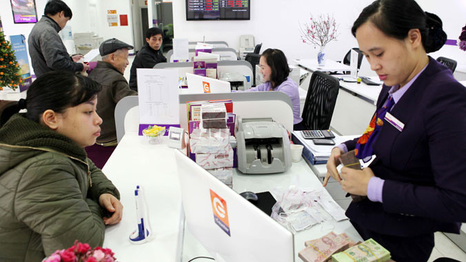 Tái cơ cấu mang lại diện mạo mới cho ngân hàng. Ảnh: Trần Việt.