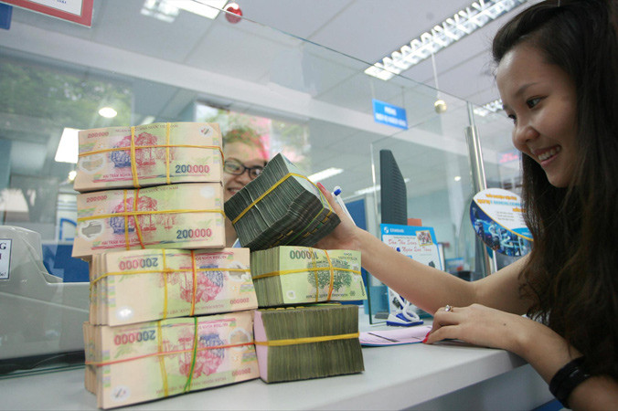 Không ít lĩnh vực dự kiến thưởng Tết lớn, trong khi đa số vẫn điệp khúc “một tháng lương”. Ảnh minh họa: Như Ý.