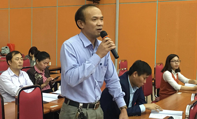 Đại diện trường ĐH đóng góp ý kiến cho dự thảo luật giáo dục ĐH. Ảnh: Nghiêm Huê.