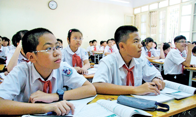 Thực hiện Thông tư 30 và mô hình trường học mới đã bộc lộ nhiều bất cập cần phải sửa đổi. Ảnh: Hồng Vĩnh.