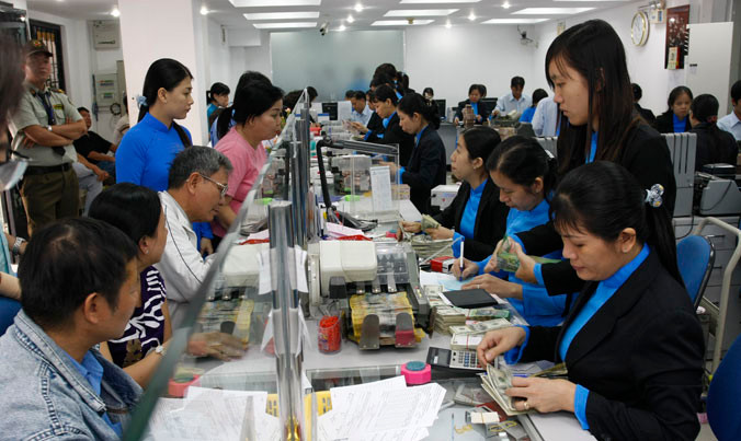 Nợ xấu là tâm điểm ĐHCĐ khi nhiều ngân hàng bán xong phải trích lập dự phòng. Ảnh: Như Ý.