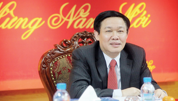 Ông Vương Ðình Huệ.