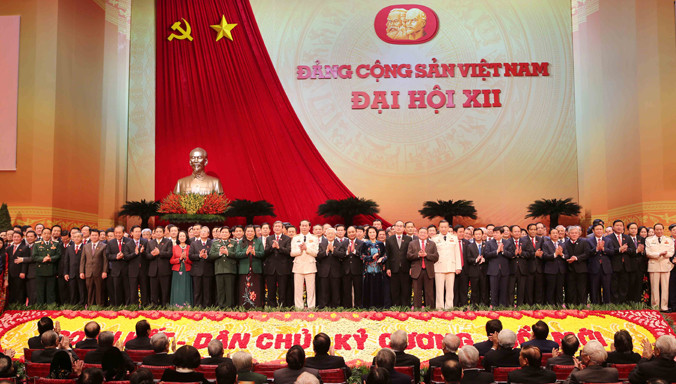 Ban chấp hành Trung ương khóa XII ra mắt Đại hội. Ảnh: Hồng Vĩnh.