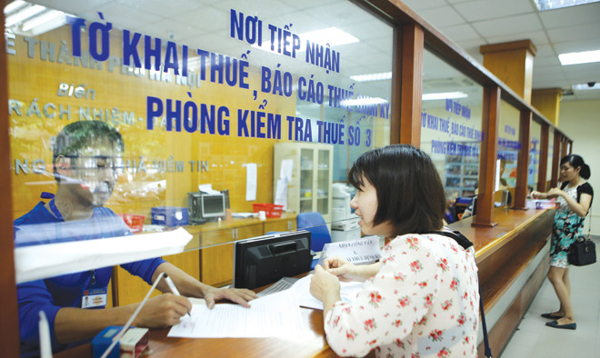 Dẹp loạn giấy phép con, đổi mới bộ máy hành chính, giảm lãi suất sẽ giúp doanh nghiệp Việt lớn mạnh. Ảnh: Như Ý.