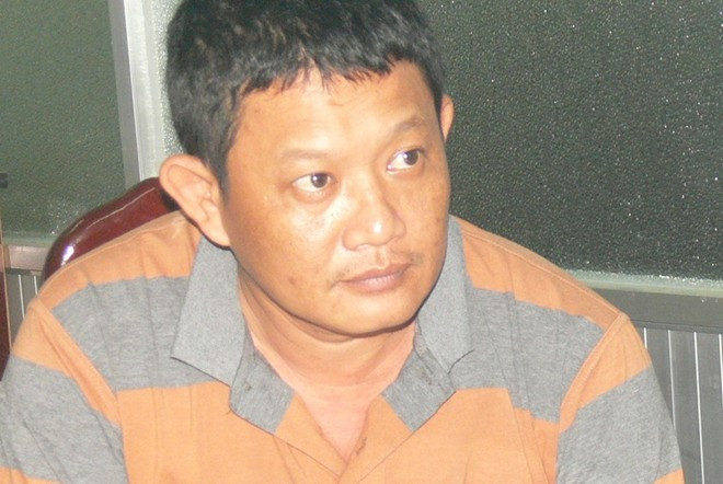 Nguyễn Thành Tâm tại cơ quan công an.