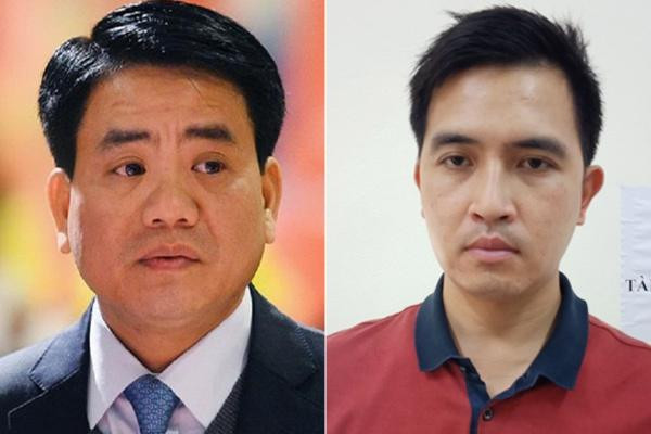 Bị can Nguyễn Đức Chung (phải) và Nguyễn Trường Giang 