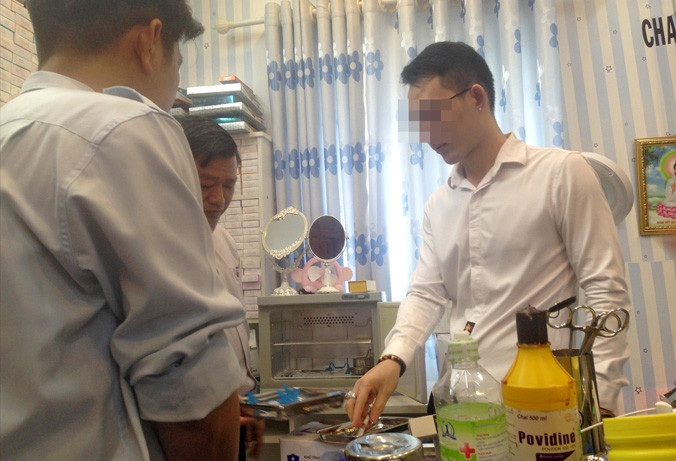 Ông Nguyễn Minh Đạt đang làm việc với cơ quan chức năng.