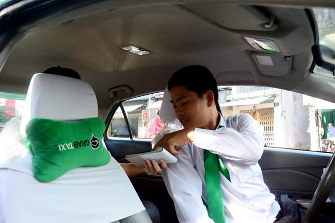 Grab cũng phải coi là taxi. Ảnh: Hồng Vĩnh.