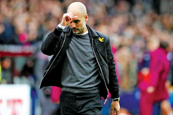 Man City của HLV Pep Guardiola kết thúc năm không vui. Ảnh: GETTY IMAGES.