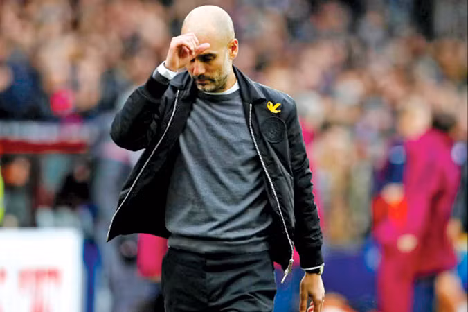 Man City của HLV Pep Guardiola kết thúc năm không vui. Ảnh: GETTY IMAGES.