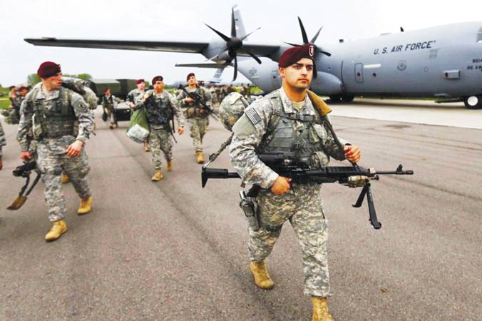 Mỹ nói họ phải chi tiền bảo vệ các đồng minh châu Âu trong khi thiệt thòi về thương mại. Ảnh: Strategic-culture.org.