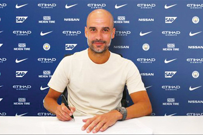 Man City “trói chân” Guardiola đến năm 2021.