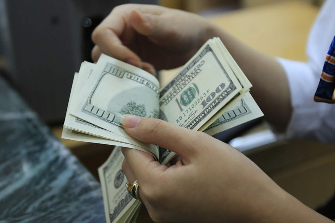 NHNN sẵn sàng bán ra USD để can thiệp thị trường.