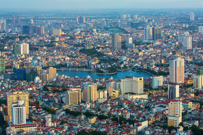 Để tránh thất thoát tài sản nhà nước, một trong những vấn đề đặt ra là phải tính đầy đủ giá trị lợi thế của đất đai khi cổ phần hóa DNNN. (Ảnh minh họa)