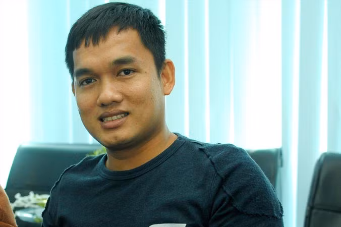 Chủ trại nấm Bùi Minh Thắng. Ảnh: Xuân Tùng.