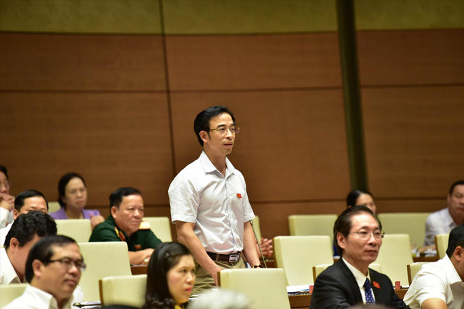 Đại biểu Nguyễn Quang Tuấn phát biểu.