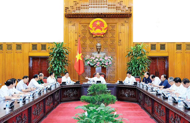 Xây dựng Chính phủ điện tử, Chính phủ không giấy tờ sẽ làm tăng tính hiệu quả, công khai, minh bạch trong các hoạt động phục vụ người dân và doanh nghiệp. Ảnh: Quang Hiếu.