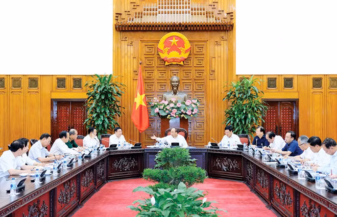 Xây dựng Chính phủ điện tử, Chính phủ không giấy tờ sẽ làm tăng tính hiệu quả, công khai, minh bạch trong các hoạt động phục vụ người dân và doanh nghiệp. Ảnh: Quang Hiếu.
