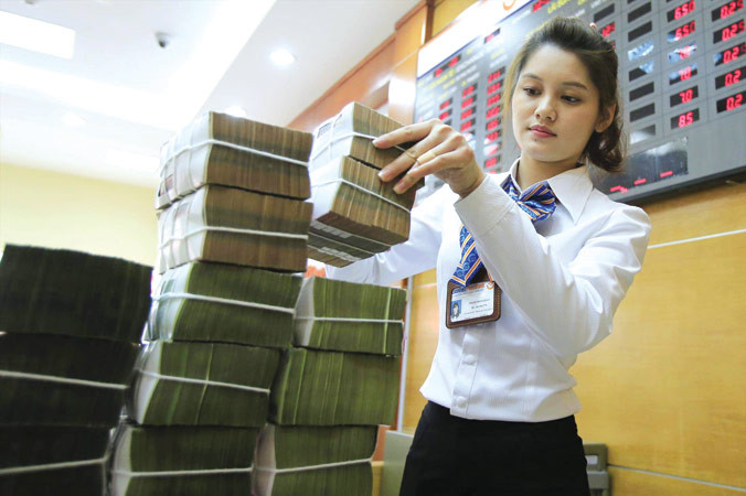 Giải ngân vốn đầu tư công chậm, trong khi nhiều dự án vẫn được duyệt với mức vốn ít sau đó cấp bù, tăng vốn. Ảnh minh họa: Như Ý.