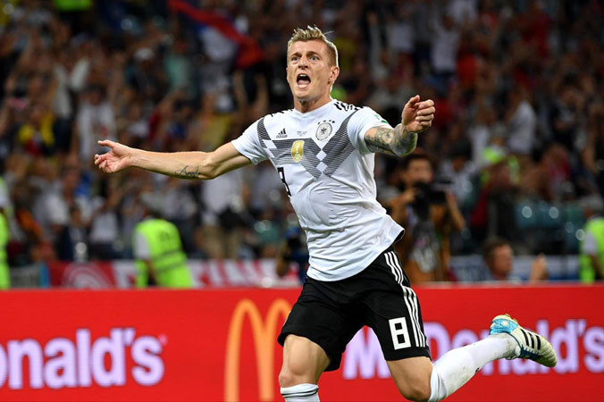 T. Kroos ăn mừng bàn thắng.