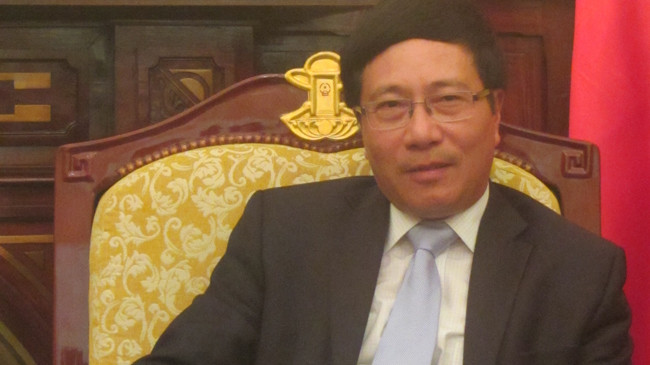 Phó Thủ tướng, Bộ trưởng Ngoại giao Phạm Bình Minh trả lời báo chí chiều 21/8. Ảnh: Trúc Quỳnh