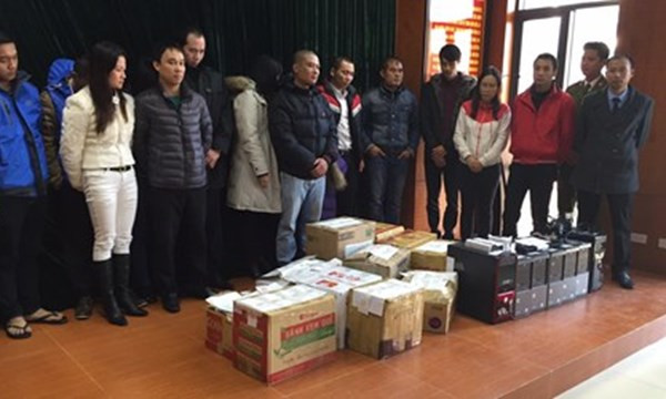 Các đối tượng trong vụ sàn vàng ảo bị bắt giữ. Ảnh: Lê Dương