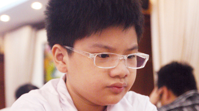 Kỳ thủ nhí Nguyễn Anh Khôi trở thành kỳ thủ Việt Nam đầu tiên đăng quang ở cả giải U10 và U12 thế giới. Ảnh: VSI