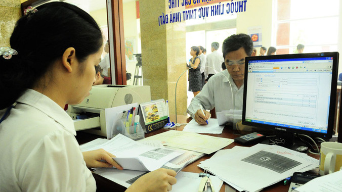 Đẩy mạnh ứng dụng công nghệ thông tin trong hoạt động của cơ quan hành chính nhằm tăng cường công khai, minh bạch và hiệu lực, hiệu quả. Ảnh: Hồng Vĩnh