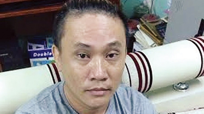 Nghi can tú ông Lê Bảo Lộc tại cơ quan điều tra. Ảnh: CA cung cấp