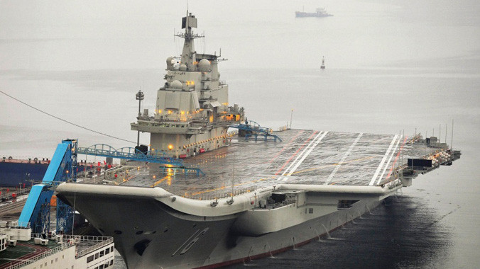 Tàu sân bay đầu tiên của Trung Quốc tên là Liêu Ninh. Ảnh: Guardian