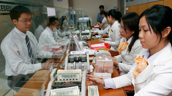 Tỷ giá sẽ ổn định trước tâm lý muốn găm ngoại tệ? Ảnh: Như Ý