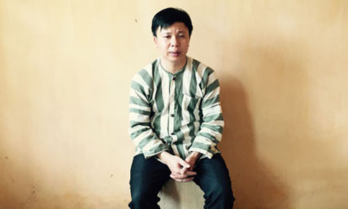 Đối tượng Trương Văn Long tại cơ quan điều tra. Ảnh: Báo Công an Nhân dân.