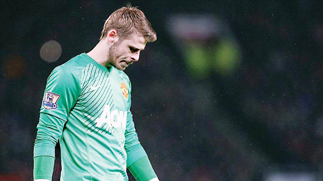 Thủ môn De Gea không có tên trong danh sách thi đấu của M.U ở 2 trận đầu tiên của mùa giải. Ảnh: PA