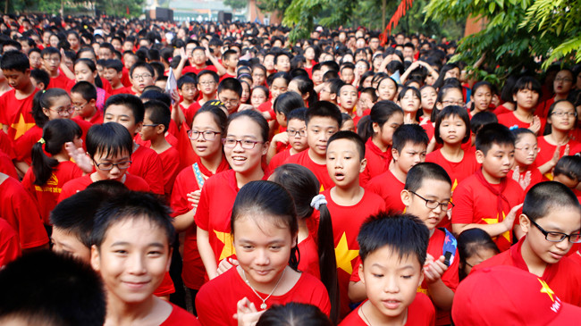 Học sinh khối lớp 6 trường THCS Lương Thế Vinh khai giảng năm học mới năm 2014. Ảnh: Ngọc Châu