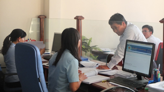 Thủ tục kiểm tra hàng hóa xuất nhập khẩu vẫn gây khó cho doanh nghiệp. Ảnh: Đức Huy