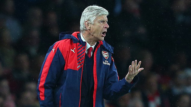 HLV Wenger bực tức trước những chỉ trích của Gary Neville về cách xây dựng đội hình của ông tại Arsenal. Ảnh: BPI