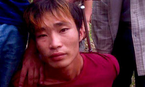 Nghi phạm Đặng Văn Hùng khi bị bắt. Ảnh: Công an huyện Văn Yên cung cấp.