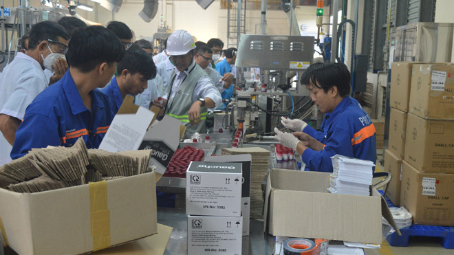 Công nhân các khu công nghiệp đã trở lại làm việc bình thường ngay sau những ngày nghỉ Tết. Ảnh: PV.