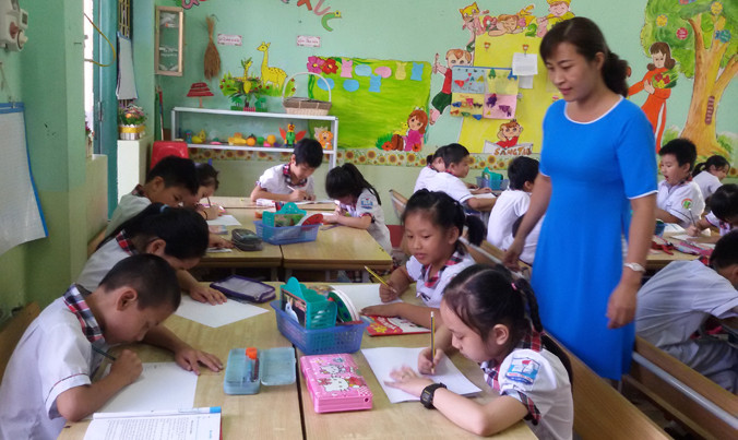 GV chính là nhân tố quyết định thành công của việc đổi mới CT-SGK. Ảnh: Nghiêm Huê.