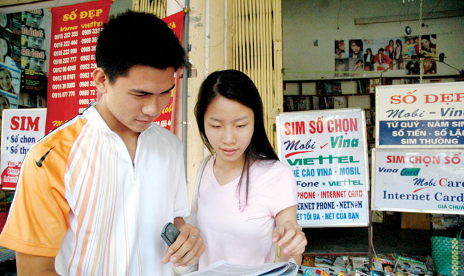 Có khoảng 120 triệu thuê bao sẽ phải gửi lại ảnh chân dung cho doanh nghiệp viễn thông. Ảnh: Hồng Vĩnh.