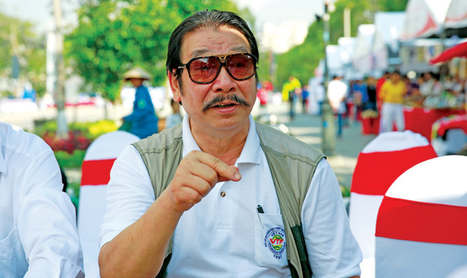 Ông Nguyễn Hồng Minh thường xuyên có mặt tại các giải Việt dã toàn quốc báo Tiền Phong để theo dõi, đánh giá tình hình phát triển các cự ly trung bình và dài của điền kinh Việt Nam. Ảnh: Hồng Vĩnh.