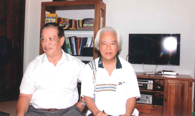 Luật sư Triệu Quốc Mạnh (trái) và tác giả.