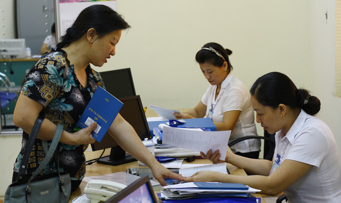 Việc doanh nghiệp nợ đọng tới hơn 14.000 tỷ đồng tiền BHXH gây ảnh hưởng nghiêm trọng đến quyền lợi của người lao động. Ảnh: Bảo Anh.