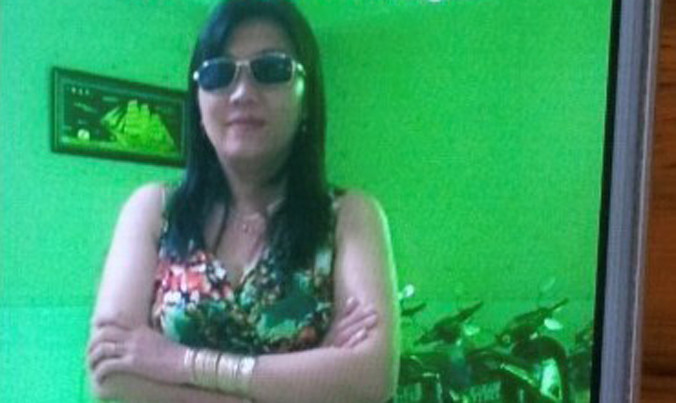 Ảnh Lê Thị Ly trong hình nền trên điện thoại di động của nghi can.