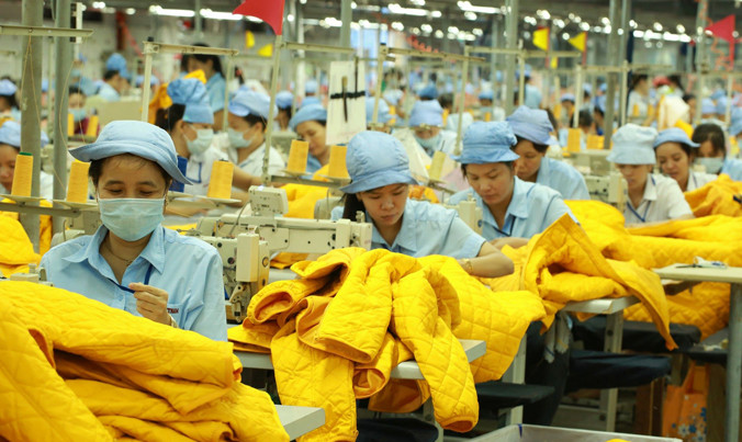 Mức tăng lương tối thiểu vùng năm 2018 có thể tương đương năm 2017. Ảnh: Phạm Thanh.