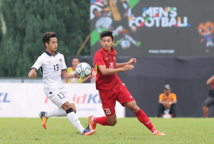 Bóng đá Việt Nam vẫn thua kém về đẳng cấp so với Thái Lan, theo đánh giá của Trưởng đoàn TTVN tại SEA Games 29 Trần Đức Phấn. Ảnh: VSI.