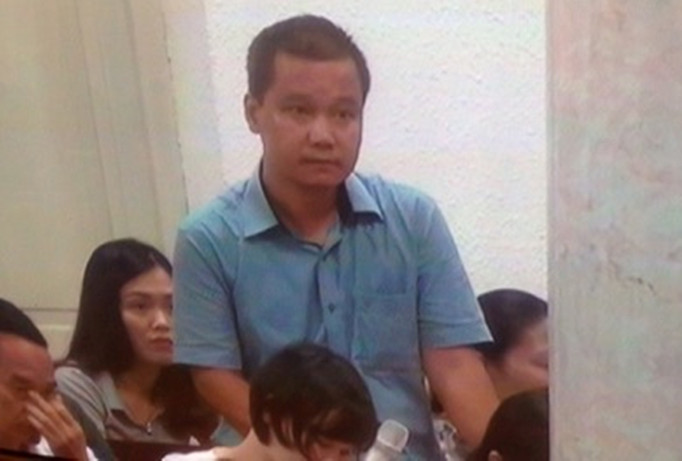 Đại diện đoàn giám định NHNN tại tòa.