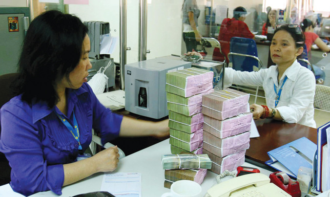 Giải ngân trong 6 tháng đầu năm mới đạt 25,6% kế hoạch Quốc hội duyệt. Ảnh: Hồng Vĩnh.